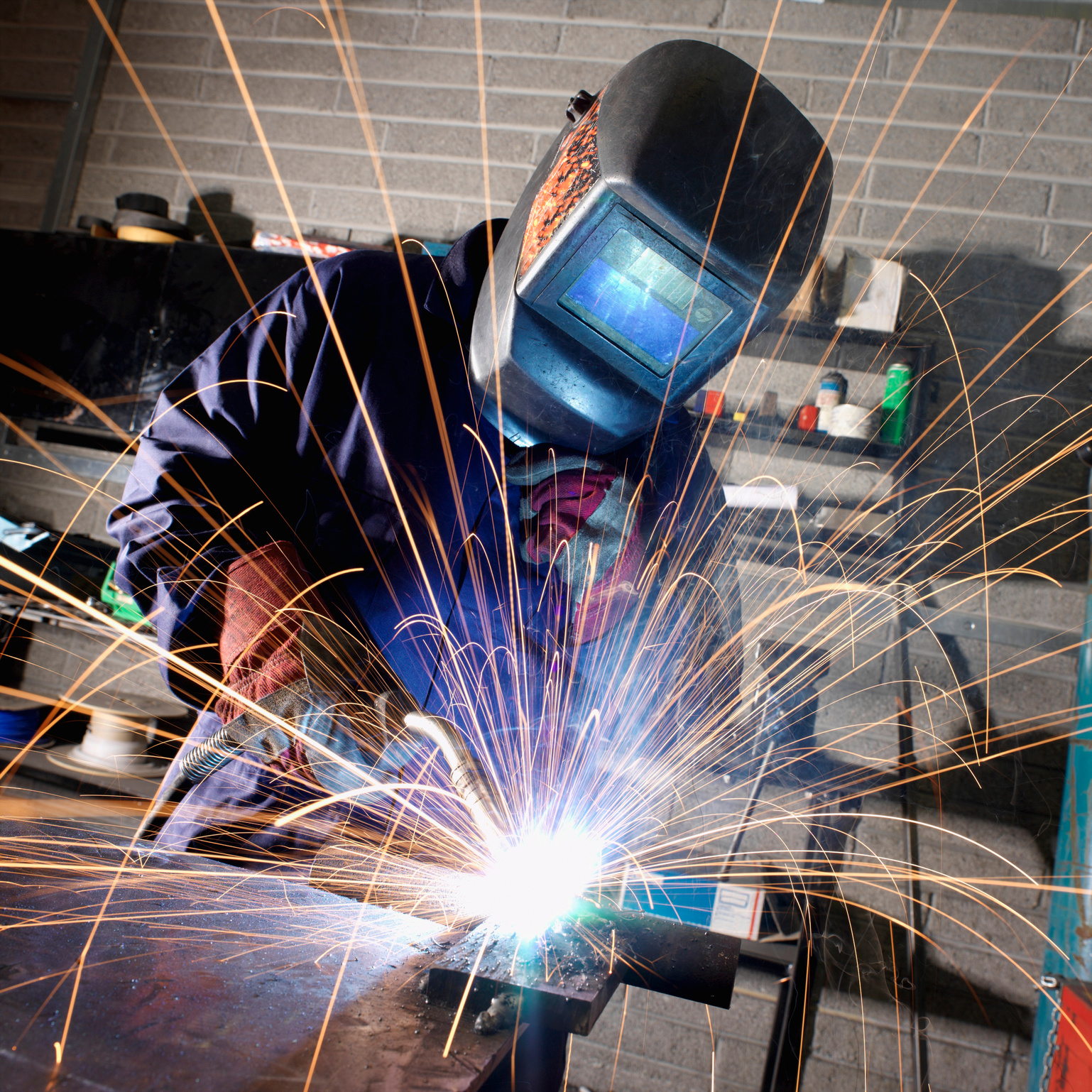 Welder working with a welding torch